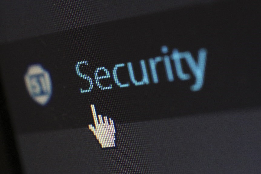 Cursor hovering over security icon on computer screen Cursor hovering over security icon on computer screen